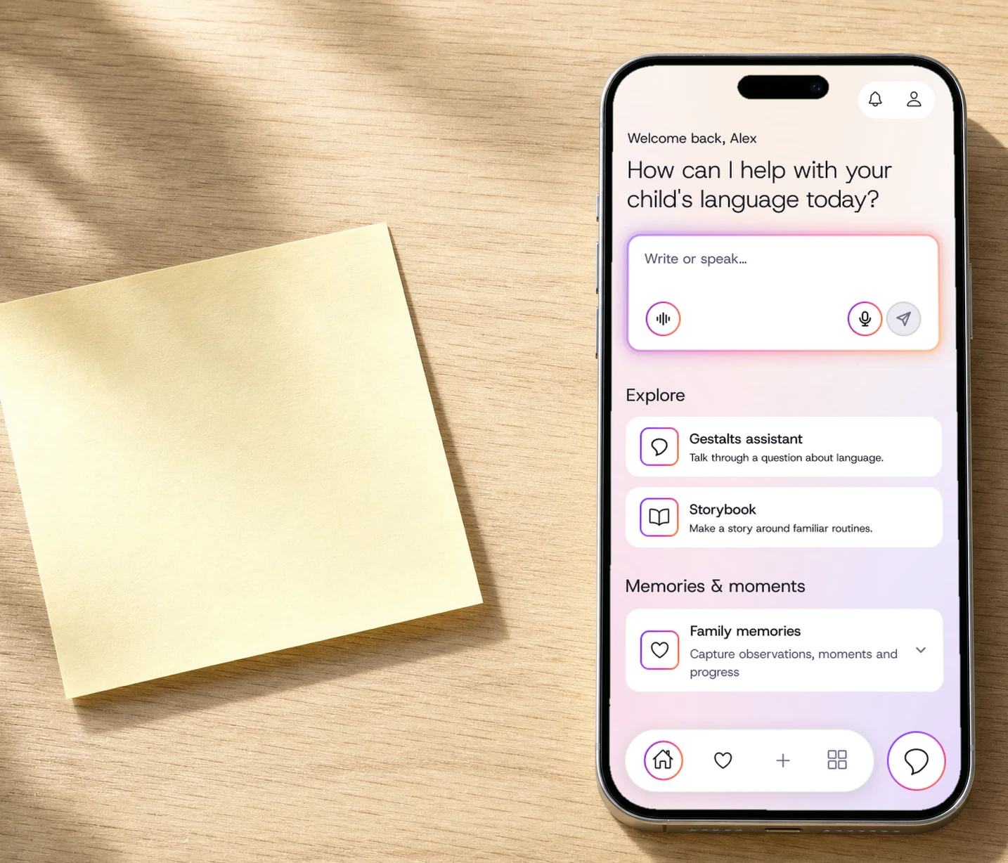 A phone on an oak table beside a sticky note, showing the Gestalts home screen